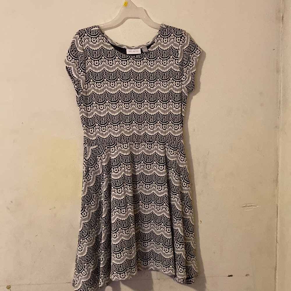 Is black and white The Children Place.Also I forgot the original price.